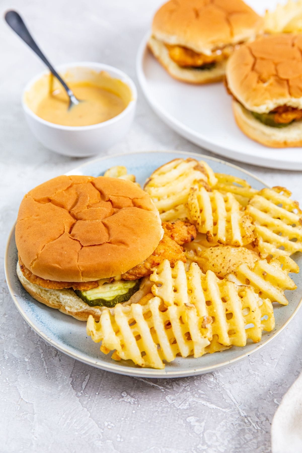 chicken Sandwich with fries.