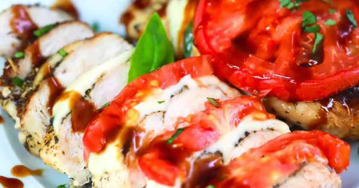 Air Fryer Dinners Close Up of Caprese Chicken Topped with Tomatoes and Balsamic Glaze