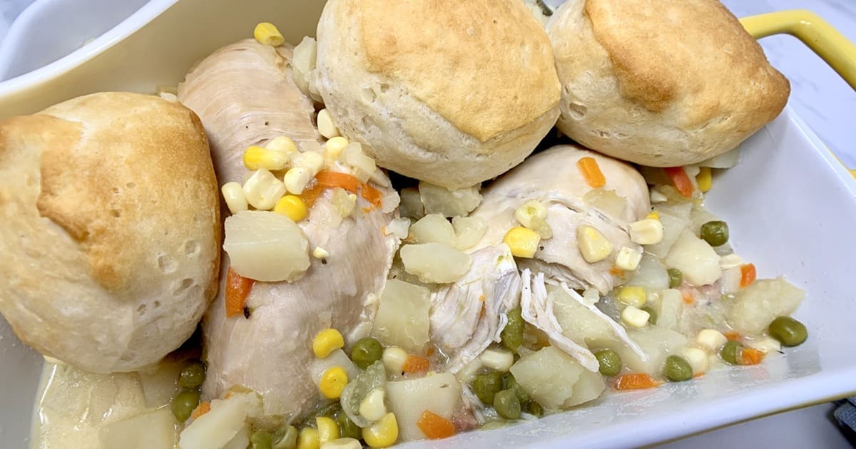 20 Easy Dinners My Family Claims Are Restaurant-Quality Close Up of Instant Pot Chicken Pot Pie Casserole with Biscuits