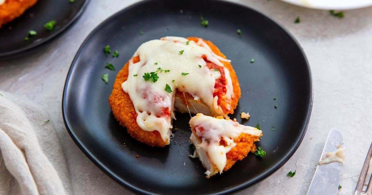 Air Fryer Recipes That Require Less Than 10 Minutes Prep a Easy Air Fryer Chicken Parm with Chicken Patty on a Plate