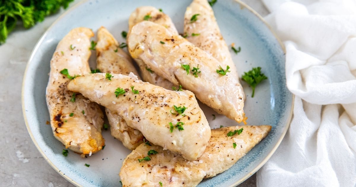 Chicken Tenders Air Fryer Recipes a Light Blue Plate of Frozen Chicken Tenders in the Air Fryer