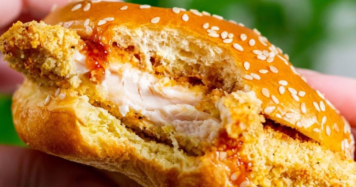 Easy Summer Air Fryer Recipes Easy Air Fryer Katsu Chicken Sandwich in a Burger Bun with a Bite Taken From It