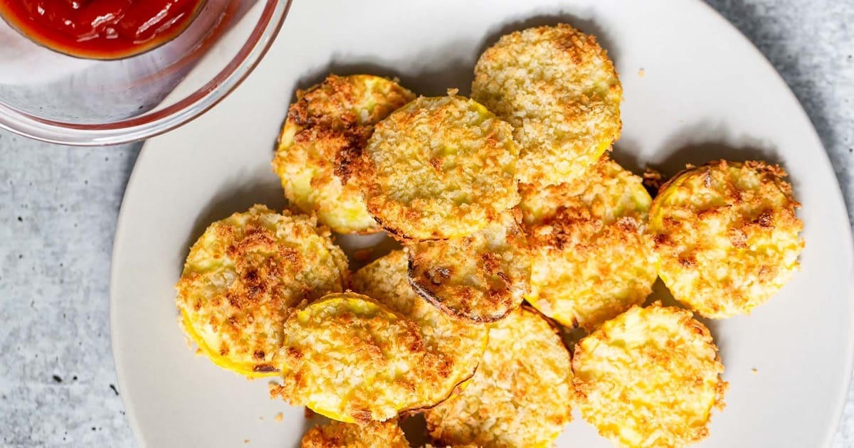 Summer Squash Air Fryer Recipes Air Fried Yellow Squash Chips on a Plate
