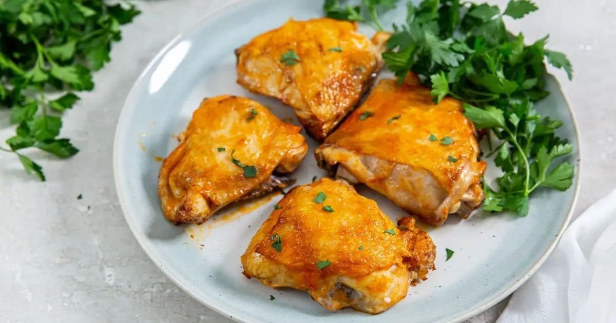 Secrets to Best Air Fryer Chicken Thighs a Plate of Air Fryer Buffalo Chicken Thighs